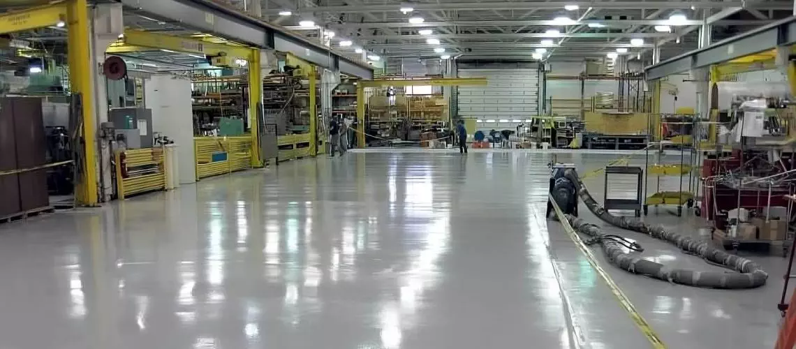 Factory floor coated with industrial-grade coatings by Memphis Coatings Company, enhancing durability, safety, and performance.